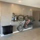bikes mounted vertically on a gray slatwall storage system Frisco TX