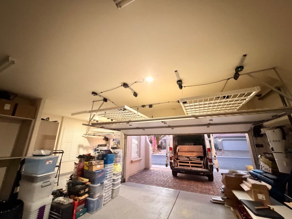 Pvc Overhead Rack Las Vegas Garage Transformation: Black Cabinets, Motorized Overhead ...